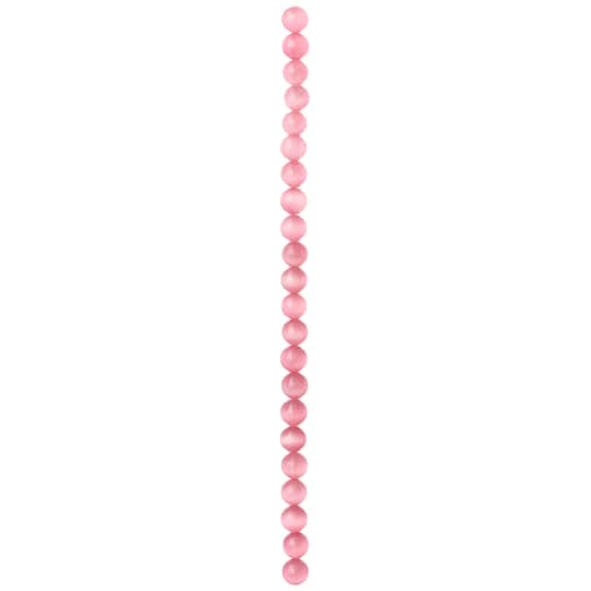 12 Pack: Pink Cat's Eye Glass Round Beads, 10mm by Bead Landing™